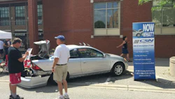 CSN-Brant County's booth at Brantford's PowerFest Car Show featured a damaged vehicle, encouraging attendees to 'Guess The Estimate.'