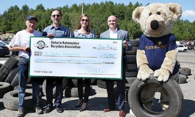 Presenting this year's donation to The Sunshine Foundation. From left: Ron Cayer of Rock City Auto Supply, Steve Fletcher of OARA, Heidi Spannbauer of The Sunshine Foundation and Andrew Horsman of OTS.