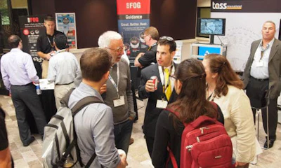 A view of the exhibitor area at Automated Vehicles Symposium 2015. The conference is the top forum for discussion of driverless technologies.