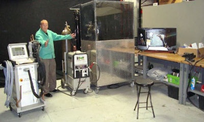 Richard Perry of Chief Automotive shows off the company's latest welding equipment.