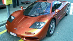 The 1996 McLaren F1, the first car to feature a carbon fibre body shell, and the price tag reflected that. However, recent indications are that carbon fibre is set to make major inroads into mass-market vehicle manufacturing.