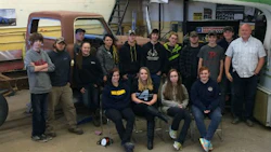 Craig Sindall of Napanee District Secondary School and the students in the Colourshop Focus program he's running this semester. Students spend full days in the shop during the program, giving them the opportunity to do large projects, such as restoring a '69 F-250 (seen here). Students are registered as Specialist High Skills Majors, which gets them extra training and a Red Seal on their Grade 12 diplomas.