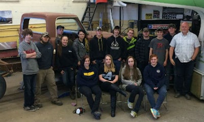 Craig Sindall of Napanee District Secondary School and the students in the Colourshop Focus program he's running this semester. Students spend full days in the shop during the program, giving them the opportunity to do large projects, such as restoring a '69 F-250 (seen here). Students are registered as Specialist High Skills Majors, which gets them extra training and a Red Seal on their Grade 12 diplomas.