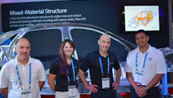 Representatives of Celette and GM at NACE with 'Skeletor,' the structure of the Cadillac CT6. From left: Stephane Jourdan, Jennie Lenk and Bastien Dias Da Costa of Celette and Joe Villanueva, Advanced Service Design Engineer for GM.