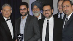 Adam and Paul Prochilo (centre, front row) accepting the Environmental Stewardship Award.