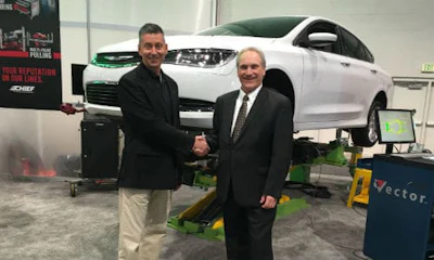 Andrea Iacucci Ostini, Export Manager for Bellini Systems (left) and Mike Cranfill, VP of Global Collision and New Business Development for Vehicle Service Group (VSG), announced an agreement giving Chief exclusive North American marketing and distribution rights for Globaljig benches, universal fixture systems and other “European style” structural repair equipment.