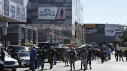 Exhibitors and attendees gather in Las Vegas on Monday before the SEMA Show officially opens.