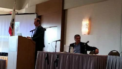 Chris Brandl (standing) and Guy Barness are committee leaders with CIC. Brandl says CIC should depart from 'granular topics' and discuss challenges likely to cause industry disruptions. Photo by John Huetter/Repairer Driven News.