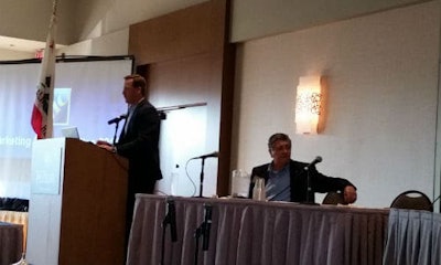 Chris Brandl (standing) and Guy Barness are committee leaders with CIC. Brandl says CIC should depart from 'granular topics' and discuss challenges likely to cause industry disruptions. Photo by John Huetter/Repairer Driven News.