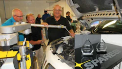 Jerry Snyder of JES Sales demonstrating the Spanesi TOUCH Electronic Measuring System at an event at CARSTAR Vision Park in Hamilton. INSET: Snyder's two awards from Spanesi.