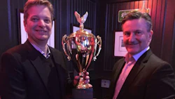 Rick Orser (right) of 3M Canada presents the Rick Berg Award to Pierre Seguin, Sales Executive for Eastern Ontario.