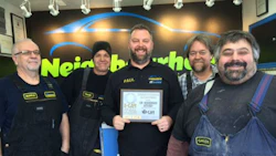 The team at CSN-Neighbourhood Auto Body proudly displays their I-CAR Gold Class certificate.