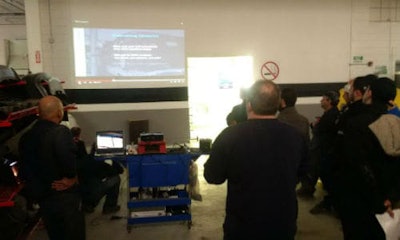 The team at CSN-Automacs watches a video after the daily production meeting. It's helped to bring enthusiasm to the grassroots.