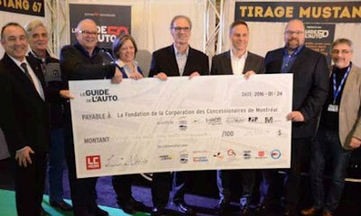 The donation. From left: Serge Gauthier, Luc Langlois, Roger Goudreau, Rachel Leduc, Luc Champagne, Jean Lemieux, Denis Dessureault and Alain Morin. Photo by Guy O’Bomsawin.