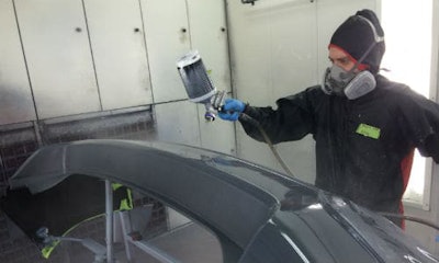 Andy Engenhardt, a master painter from Germany, demonstrates proper technique during one of the training sessions.