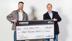 Calgary Flames Defenceman TJ Brodie and Mike Piper, CARSTAR Canada Western Region Director.