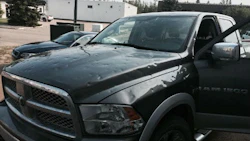 A hail-damaged vehicle in Red Deer, Alberta. There is evidence that hail storms are increasing in severity, leading to a greater need for PDR technicians.