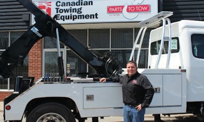 A staff member demonstrates a truck's features at the open house event. Check out the gallery below for more photos!