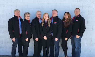 Marty Reddick, Adina Antal, Bernie Reddick, Jenny Reddick, Chris Reddick, Sarah Da Silva and Dave Friars of Supreme Collicions Centres, the first facilities to be awarded with the certification in Canada.