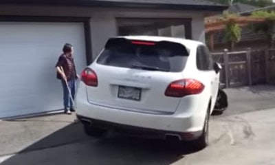 A strong contender for the title of world's worst parking job. Note the front right tire is clearly in bad shape, and this is right at the beginning. You can see the whole sorry mess for yourself in the player below.