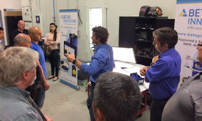 A demo by BETAG Innovations draws a crowd at the event held at the Color Compass training centre.