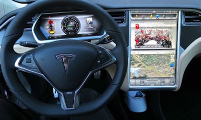 The dash of a different Tesla Model S. Recent reports indicate the driver may have been watching a movie on a portable DVD player at the time of the crash.