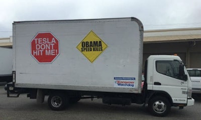 Consumer Watchdog camped out at the Automated Vehicles Symposium 2016 in San Francisco yesterday to protest against Tesla's self-driving cars. The organization turned up with a white truck highlighting the shortcomings of Tesla's Autopilot in the death of Joshua Brown earlier this year.