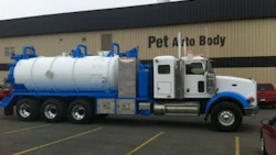 Outside PET Auto Body in Calgary. Everything about the heavy truck repair facilities is bigger than usual, from the facilities themselves to the oversized paint booths.