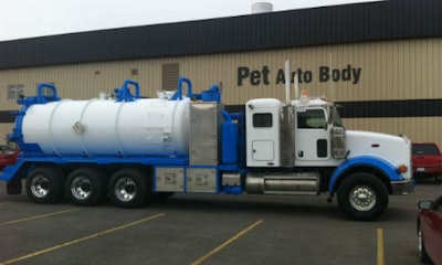 Outside PET Auto Body in Calgary. Everything about the heavy truck repair facilities is bigger than usual, from the facilities themselves to the oversized paint booths.