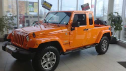 There's no mistaking this converted Jeep for a stock model. The conversion to a mini pick-up was done with a Mopar body kit.