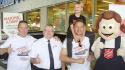 Team members from Craftsman Collision and the Salvation Army during last year's 'Make a Dent' campaign. Craftsman Collision has raised $217,276.42 in food and cash for the Salvation Army since 2009.