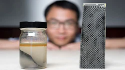 A research team at Georgia Tech has developed a new way of recycling carbon. Pictured above, one of the men involved in the project Kai Yu shows off the team's method - immersing carbon fibre composites in alcohol.