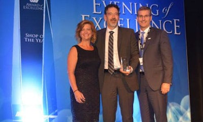 Gary Laschuk of CSN-Reflections accepts the award for CSN Shop of the Year from Alberta Regional Manager Kari Barton and Manager of Network Performance Mark Roesch (right).