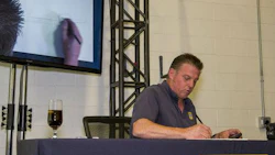 Chip Foose sketching at an event hosted by Carlson Body Shop Supply. Capital One Spark Business will host Foose for a special session during the SEMA Show where he will share his insights on small business.