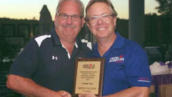 Speedy Collision CEO Terry Allen accepting the title sponsorship plaque from Crime Stoppers of Halton Chair Doug Maybee.