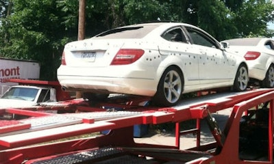 Just another day in the shop … or maybe not. Those tiny dents are apparently bullet holes.