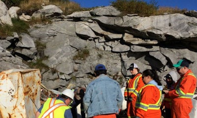 On the scene at one of the Tundra Take-Back locations in 2016. A big part of the project involves professional automotive recyclers training local people to maintain the clean-up efforts in an environmentally conscious way.