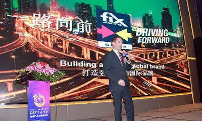 Carl Brabander, Fix Auto World Vice President of Marketing, presenting on Fix Auto's global vision at Automechanika Shanghai.