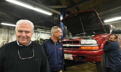 Jerry Greeff, left, the owner of One Stop Auto Service, has donated his business to Vehicles for Change, a non-profit organization. Photo by Amy Davis/Baltimore Sun.