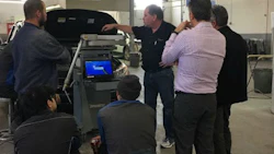 Tom McGee (centre) conducts a Touch training class at Prochilo Brothers.