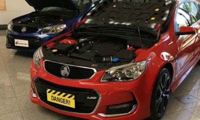 Geniune Holden hood on the left, counterfeit on the right. Aside from the sheer illegality, the main concern is that the counterfeit hoods are made from steel rather than aluminum. The vehicles in question were not designed with steel hoods in mind, and the associated parts can't handle the weight.