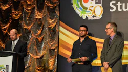Anthony Iaboni of Collision 360 (centre), about to present the scholarship at Centennial College's Student Awards Night.