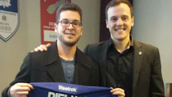 Alex Mandarino (left) holds the signed jersey he received after a night at a Leafs’ game with Daniel Di Carlo. Mandarino is a young cancer survivor. He and his parents took in the game courtesy of tickets donated by Joe Di Carlo of CSN-J&J Dominion Collision.
