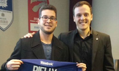 Alex Mandarino (left) holds the signed jersey he received after a night at a Leafs’ game with Daniel Di Carlo. Mandarino is a young cancer survivor. He and his parents took in the game courtesy of tickets donated by Joe Di Carlo of CSN-J&J Dominion Collision.