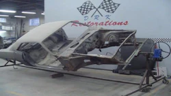 A vintage car undergoing work at DRK Restorations.
