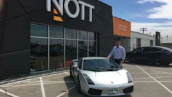 Trevor Nott, President of Nott Autocorp and one of the founders of Winnipeg's new Exotic Driver's Club, with a Lamborghini Galardo Coupe, one of eight cars being offered for rental through club.