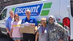 Parkdale Community Foodbank is helping out some of Tropicana's autobody students with regular food deliveries. Jack Martino, centre, is the co-owner of CSN-Martino Brothers Collision and Executive Director of the food bank.