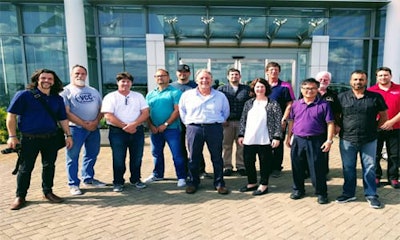 The whole crew standing outside the BMW Performance Centre. From left to right: Alex Dugas from Media Matters, Inc. David Cross and Robin Popow from Vancouver Community College. Raymond Bourgeois from Allstate Insurance. Shane Roset from Saskatchewan Polytechnic. Dan and Jeff Doot from BMW North America. Brigitte Pesant from AIA Canada. Sid Petrisor from SGI. Gary Lin from BMW Canada. John Norris from CIIA. Randy Sandhu from BCIT. Mike Kenelly from Fanshawe College.