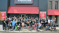 Volunteers at CARSTAR Brampton during CARSTAR's annual Soaps It Up carwash. CARSTAR and partners across the country come together every year to raise funds for Cystic Fibrosis Canada.
