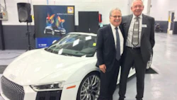 Bill Harbottle, President of Jim Pattison Auto Group, and Bill Hatswell, President/Owner of Distinctive Auto Works and the Craftsman Group. The new DAW location in Edmonton is the 40th facility in the Craftsman Group.
